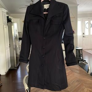 Vintage Norma Kamali coat. Navy. Size 2. Has shoulder pads.
